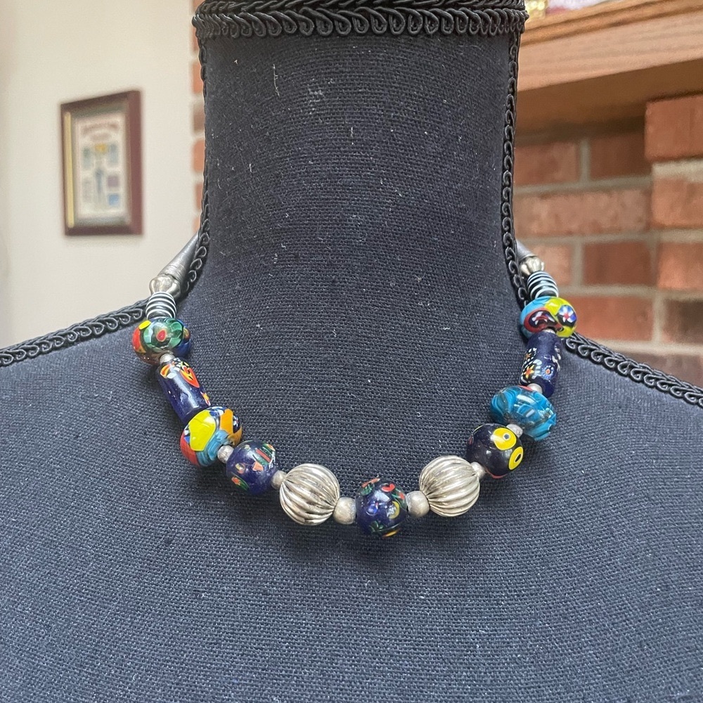 Multi-colored necklace with hook closure